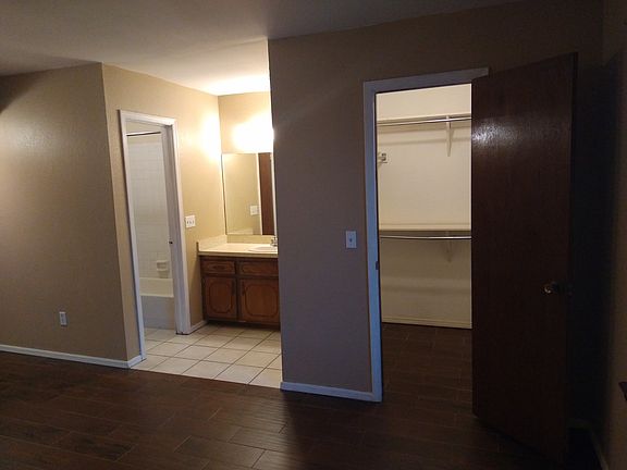 Master bedroom with large walk in closet and full bathroom.