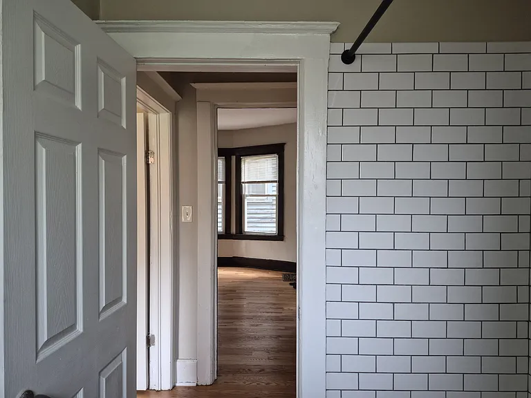 View of hall and dining room from the bathroom.