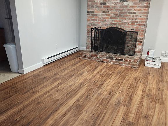 Living room - Working fireplace; engineered-hardword floors