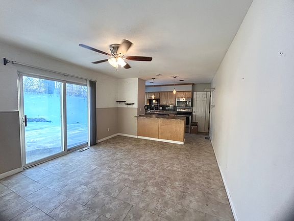 Breakfast area open up to kitchen. Vinyl tile flooring. Natural light. Sliding door walk out to back patio/private fenced backyard. Dimensions for kitchen/breakfast are 22x12.