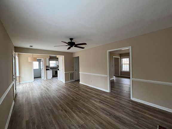 Family room (18' x 12') includes fireplace. Family room opens into breakfast nook (11' x 9').