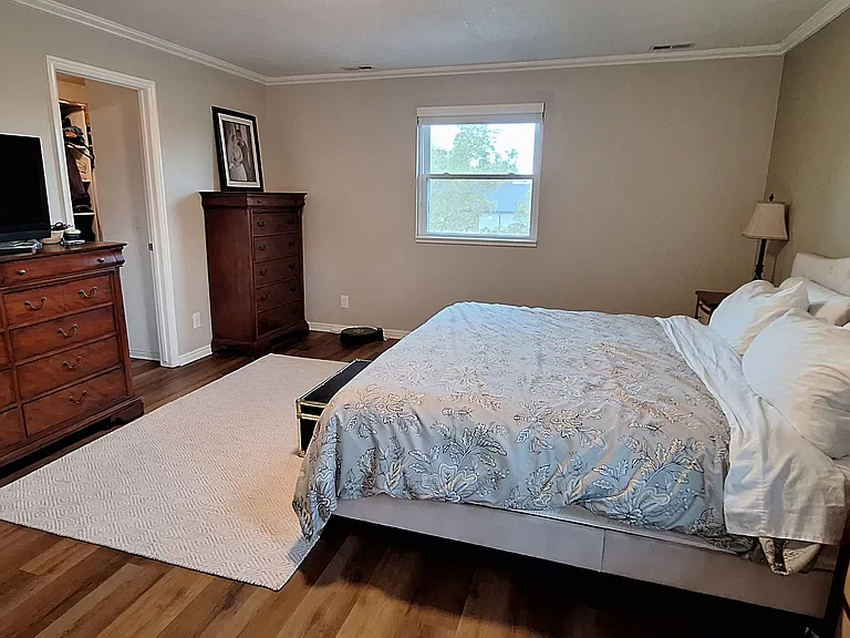 Master bed with walk in closet