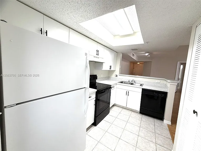 5045 Wiles Rd #201 — Photo 9