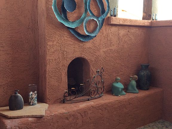 Exterior shower w/ fireplace