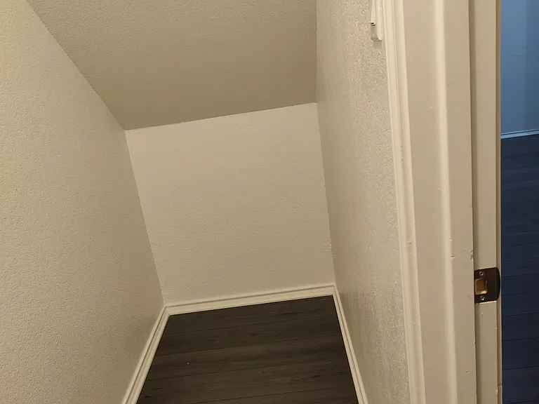 Storage space - under the stairs