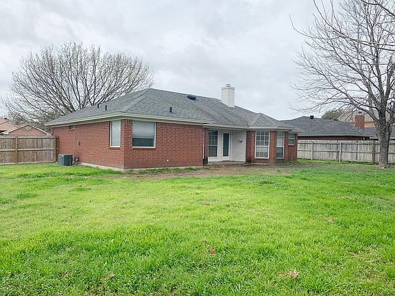 Huge Backyard with small porch.