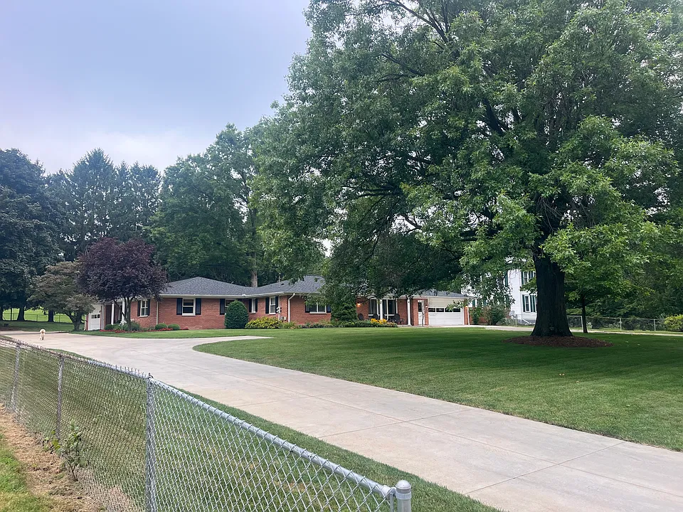 Spacious 1 acre lot shared by both properties