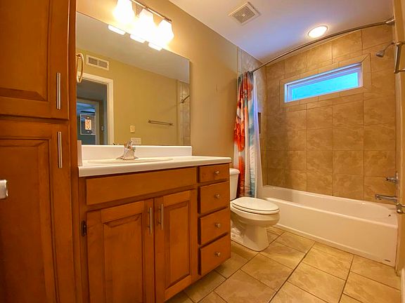 Plenty of bathroom cabinet space.