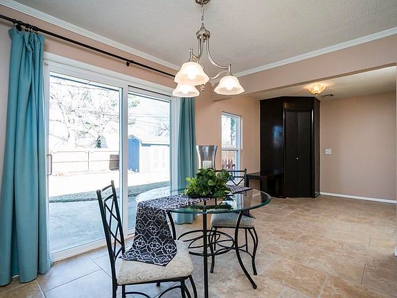 Dining area with adjacent utility/bonus room.