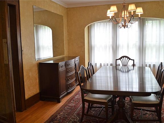 Formal dining room leads into the kitchen