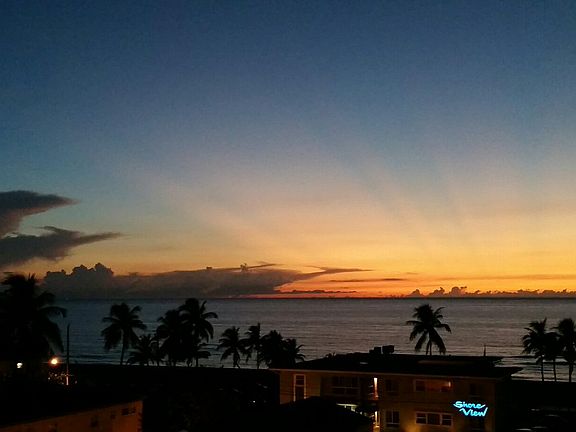 view of sunrise from balcony