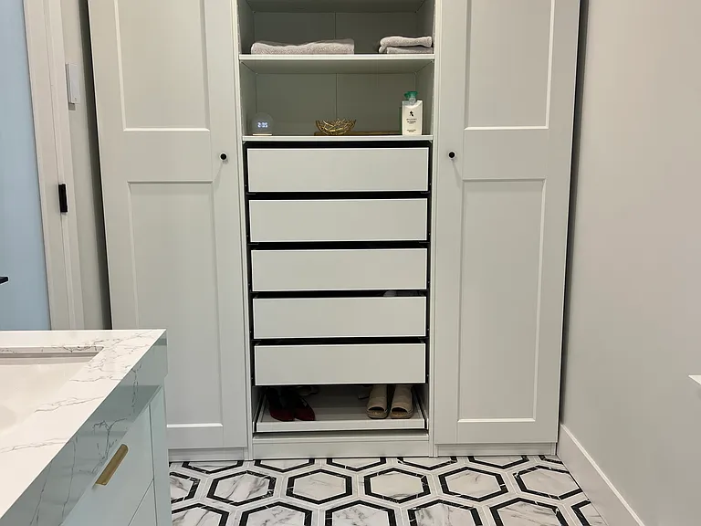 Built in closets in the primary bathroom