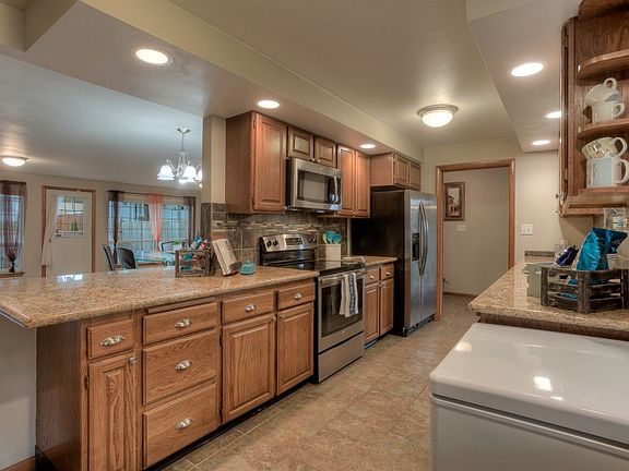 4th image of 9815 Farwest Dr SW