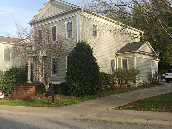 Driveway on side of house to attached 2 car garage