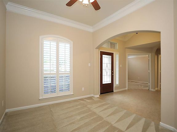 To the right of the entry is this extra living space - it would make a great music room and a downstairs play area.