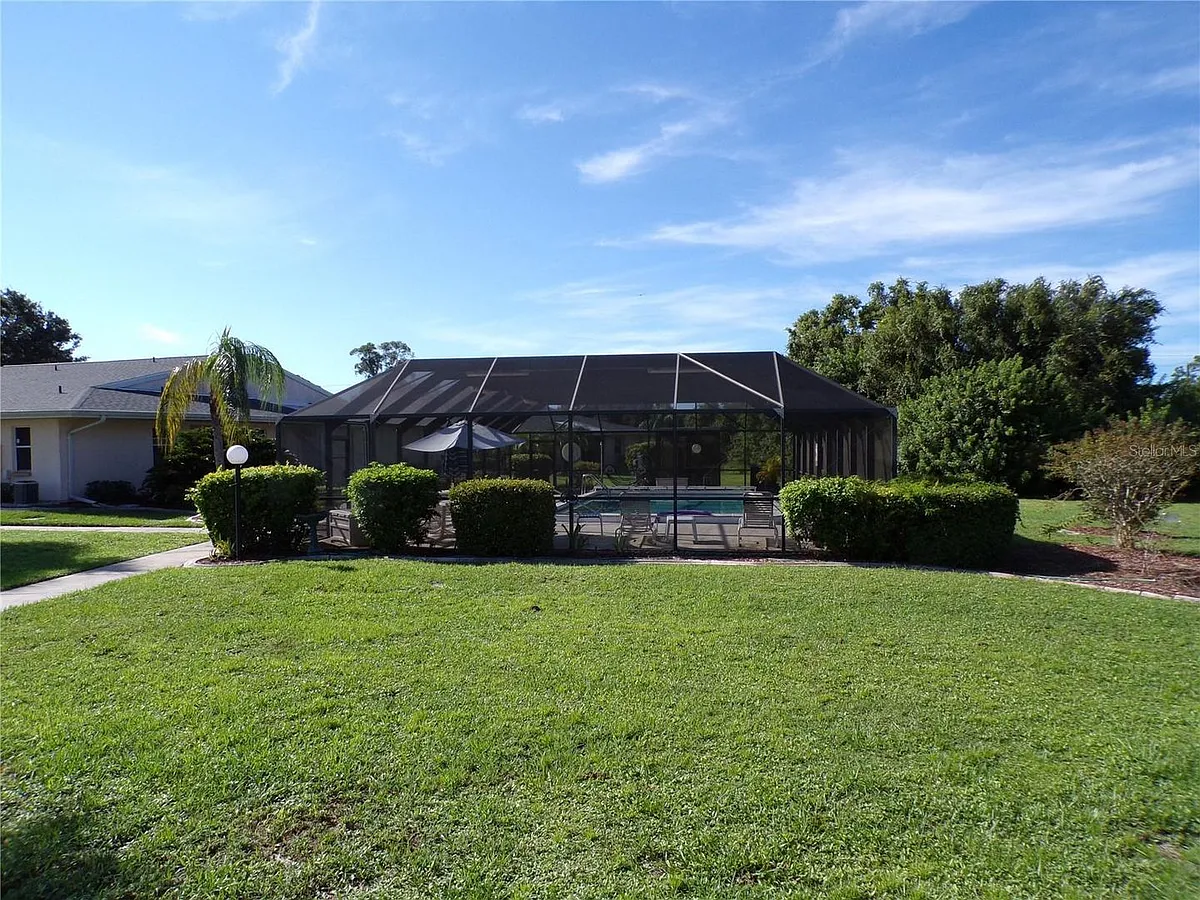 Photo 2 of 18 - 25068 Harborview Rd #4B - Punta Gorda, FL Building Photo - 25068 Harborview Rd #4B