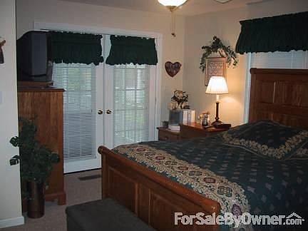 Partial view of Master Bedroom
						:
						French doors to back porch