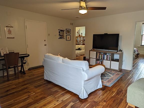 Spacious family room offers entry from the staircase or the massive deck
