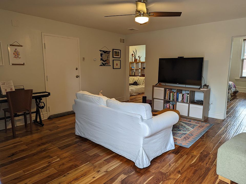 Spacious family room offers entry from the staircase or the massive deck