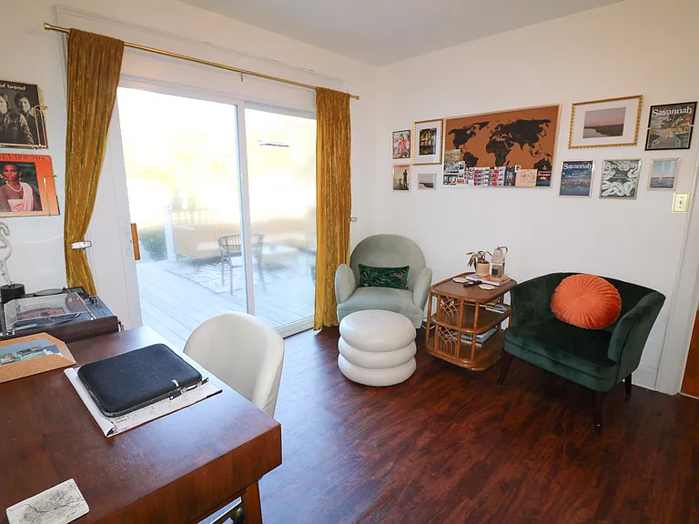 Bonus room with dedicated work space and seating could be used as an office or casual extra living space