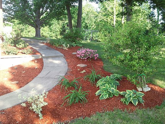 Walkway leading to back yard