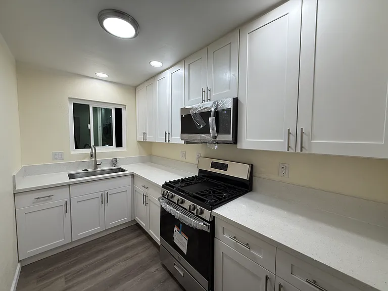 Kitchen with new stainless appliances