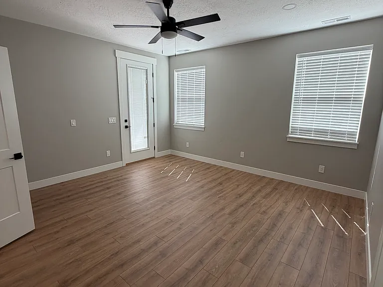 Large Master Bedroom includes access to large west facing covered deck.