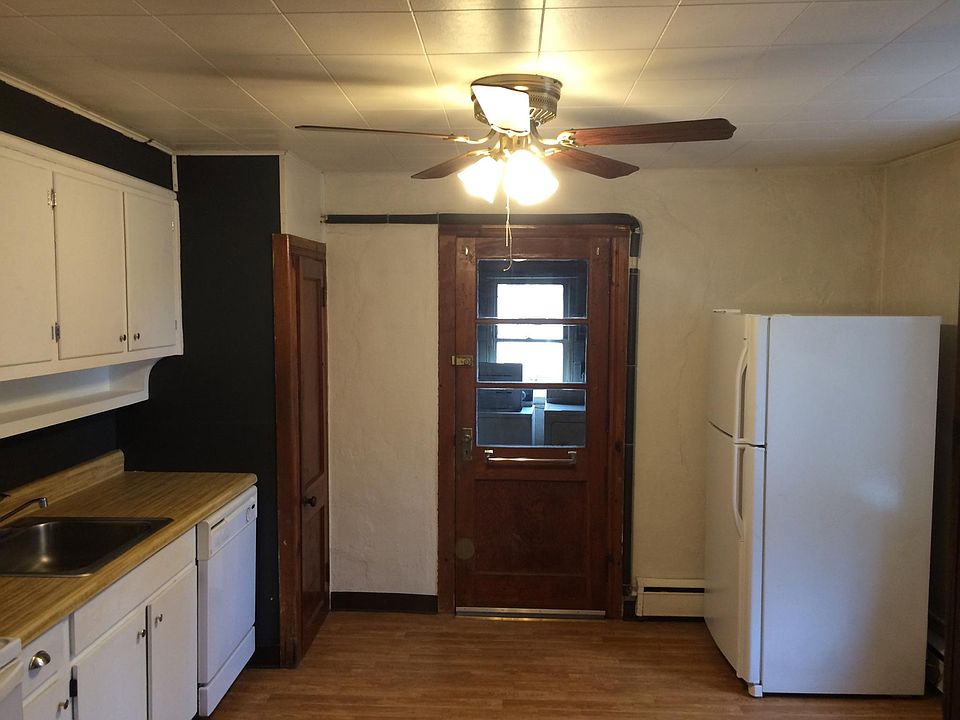 Kitchen with door leading to laundry room
