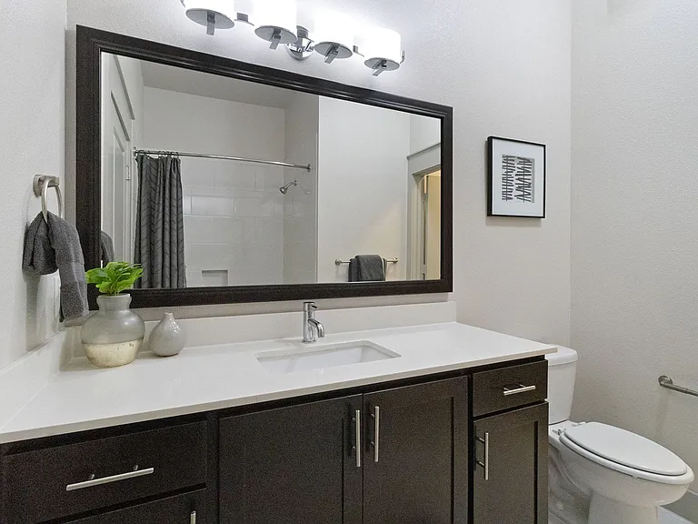 Large bathrooms with granite or quartz countertops