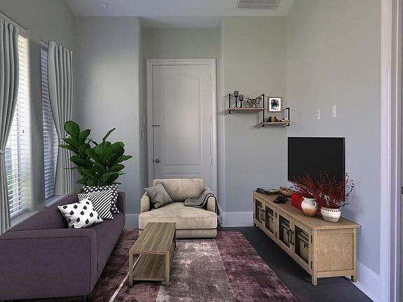 Living room area: hardwood floors, high ceilings, lots of natural light