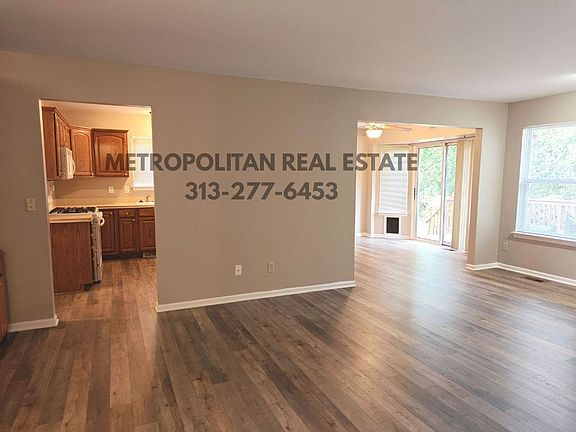 Living Room, Kitchen through left doorway, dining through right