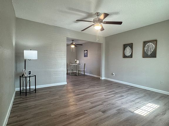 Our newly renovated townhomes feature an open, bright layout with modern wood_style flooring, neutral walls and plenty of natural light. The seamless flow into the dining area and updated fixtures create a comfortable, versatile space for everyday living.