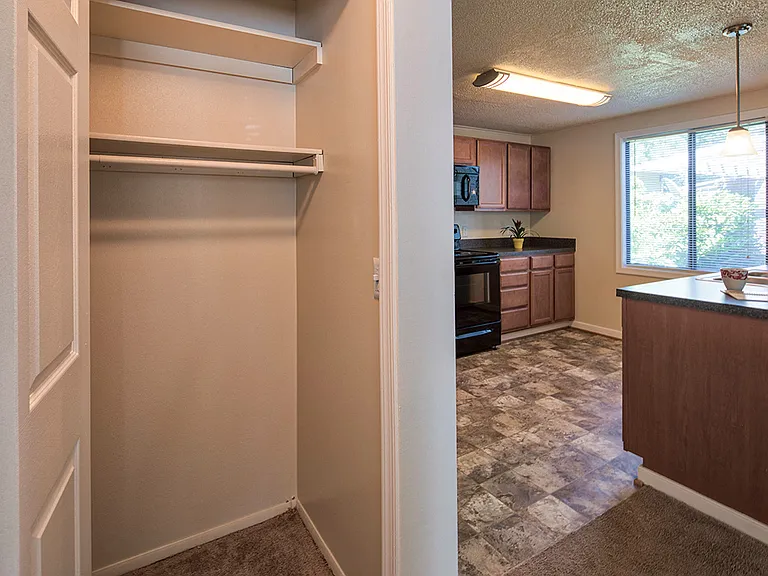 Hall closet in the one bedroom apartment
