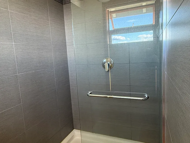 A walk in Shower in the Primary Bathroom.
