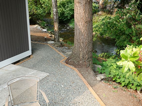 WALKWAY TO BACK PATIO ALONG CREEK