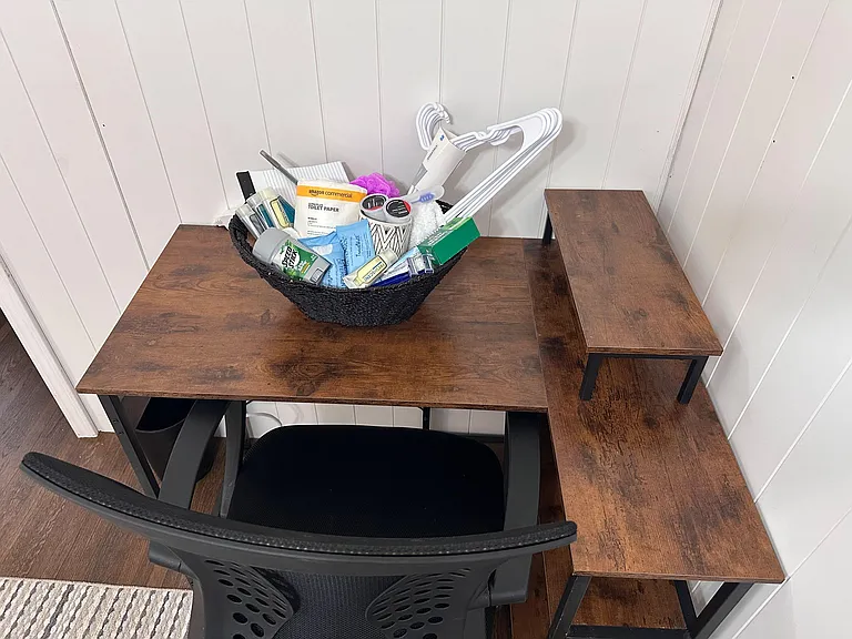 Yup! We've got a desk with an ergonomic chair.