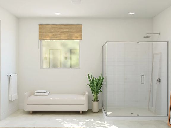 Primary bath with glass shower enclosure