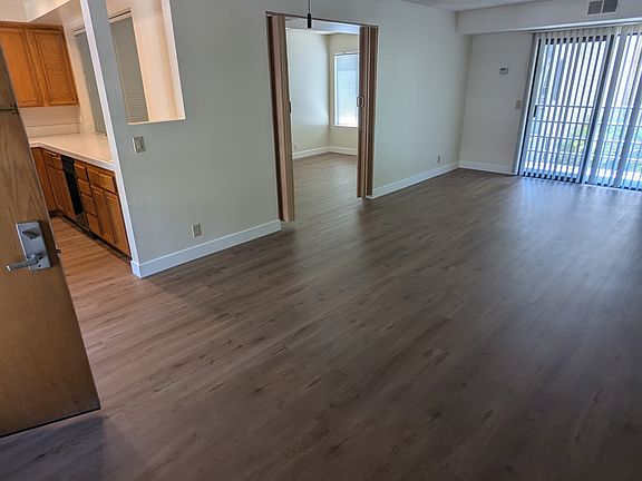 living room, dining room, entry to den. kitchen