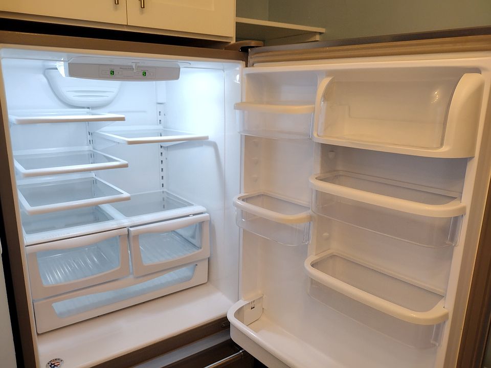 Refrigerator bottom freezer with ice maker.