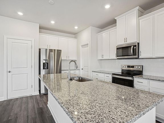 Cook your favorite meal in the spacious and functional kitchen.