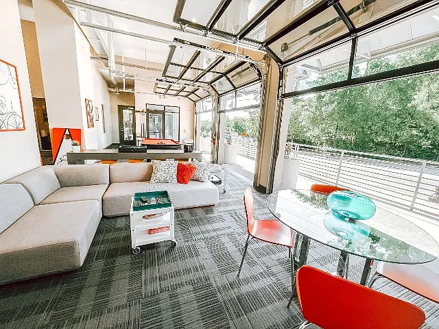 Resident Lounge with open garage doors!