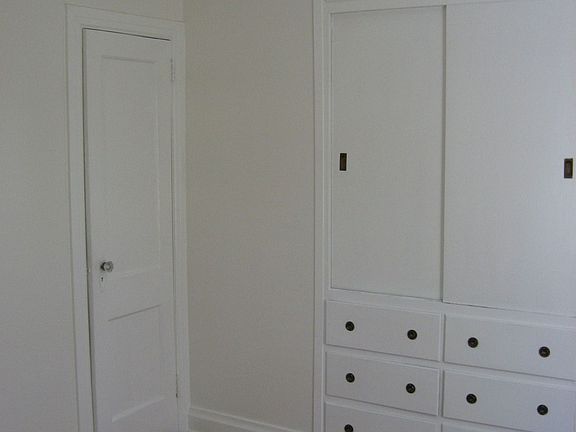 Bedroom on ground flr has bath, walk-in closet and built-in wardrobe.