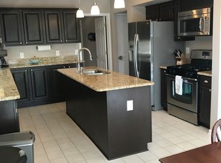 57305 Copper Creek Dr, Washington, MI 48094