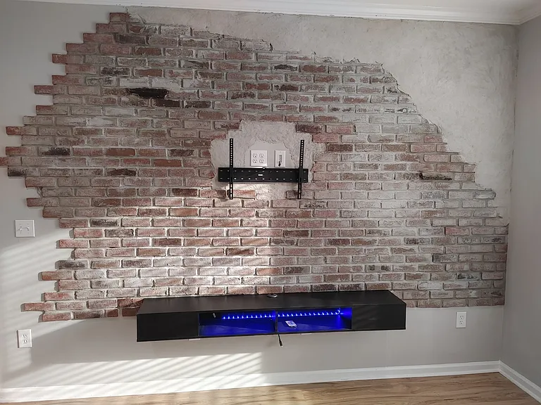 Newly built in brick accent with Tv console.