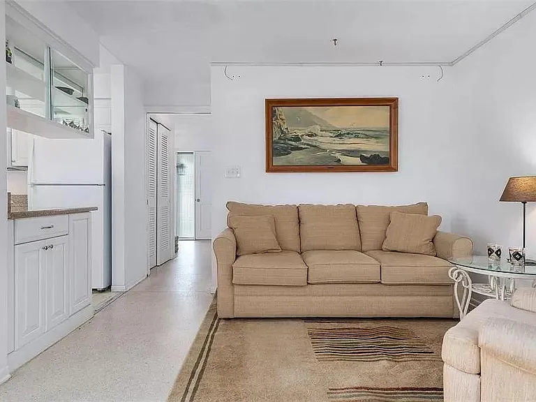 Family room looking towards kitchen & entry