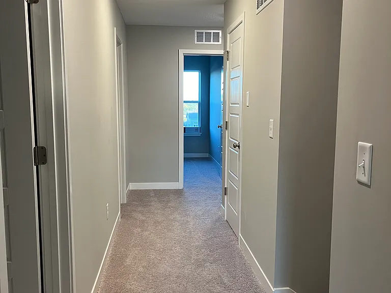 Hallway to additional bedrooms