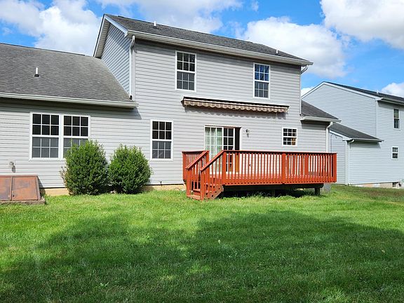 view of deck and back of house