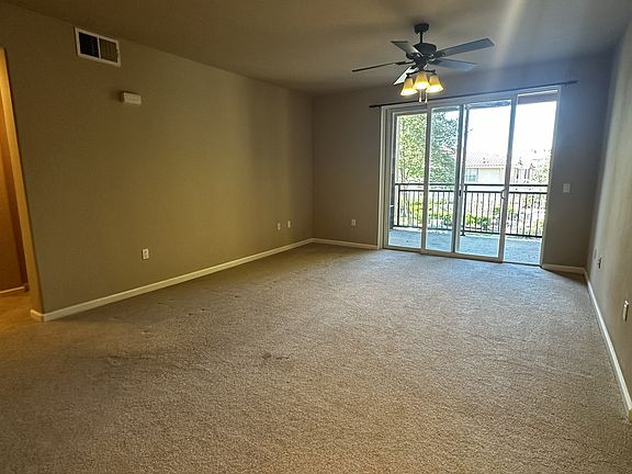 Living Room with Spacious Balcony