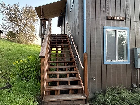 Front stairs for access to deck and front door.