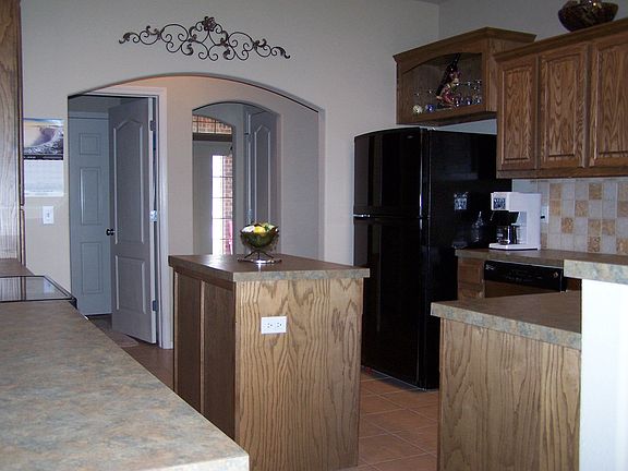 Beautiful kitchen with island and lots of counter/cabinets!